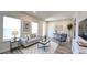 Inviting living room with neutral tones, comfortable seating, and plenty of natural light at 1710 Summer Rose Dr, Mount Dora, FL 32757