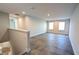 Spacious loft area with hardwood floors, natural light, and plenty of room for a home office or play area at 1710 Summer Rose Dr, Mount Dora, FL 32757