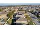 Aerial view of two-story house with solar panels, pool, and screened lanai at 1741 Bonser Rd, Minneola, FL 34715
