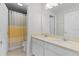 Clean bathroom with double vanity and shower at 1741 Bonser Rd, Minneola, FL 34715