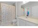 Clean bathroom with a shower/tub combo and updated vanity at 1741 Bonser Rd, Minneola, FL 34715