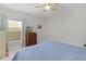Spacious bedroom with a dresser and large window providing natural light at 1741 Bonser Rd, Minneola, FL 34715