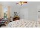 Bedroom with TV, dresser, and gaming chair at 1741 Bonser Rd, Minneola, FL 34715