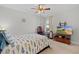 Cozy bedroom with a comfortable bed and a TV at 1741 Bonser Rd, Minneola, FL 34715