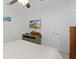 Bright bedroom featuring a double bed and large closet at 1741 Bonser Rd, Minneola, FL 34715
