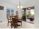 Eat-in kitchen dining area with sliding door to backyard at 1741 Bonser Rd, Minneola, FL 34715