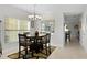 Dining area with table and chairs near kitchen at 1741 Bonser Rd, Minneola, FL 34715