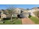 Two-story house with landscaping and brick driveway at 1741 Bonser Rd, Minneola, FL 34715