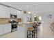 Modern kitchen with stainless steel appliances and granite countertops at 1741 Bonser Rd, Minneola, FL 34715