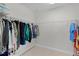 Spacious walk-in closet with double hanging rods at 1741 Bonser Rd, Minneola, FL 34715