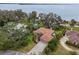 Property's aerial view showcasing waterfront location and neighborhood at 1752 Waterview Dr, Leesburg, FL 34748