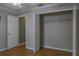 Bedroom features a spacious closet, wood floors, and a ceiling fan at 1761 12Th St, Orange City, FL 32763