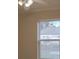 A cozy bedroom featuring a bright window offering a pleasant view at 1761 12Th St, Orange City, FL 32763