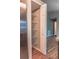 Spacious pantry with wire shelving, providing ample storage space next to stainless steel refrigerator at 1761 12Th St, Orange City, FL 32763