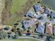 Aerial view of house and surrounding neighborhood at 1877 Quailey Ct, The Villages, FL 32163