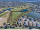 Aerial view showing home's location in a golf course community at 1877 Quailey Ct, The Villages, FL 32163