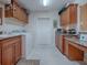 Laundry room with washer, dryer, and built-in cabinets at 1877 Quailey Ct, The Villages, FL 32163