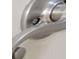 Close-up of stylish brushed metal door handle hardware at 2169 Smoaks St, The Villages, FL 32162