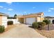 Charming one-story home with a two car garage and well-maintained landscaping at 2169 Smoaks St, The Villages, FL 32162
