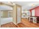 Open floor plan featuring a view from kitchen to the dining room and living room at 2169 Smoaks St, The Villages, FL 32162