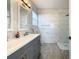 Modern bathroom with double vanity and a walk-in shower at 223 Knollwood Dr, Davenport, FL 33837