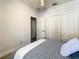 Bedroom with a double bed and double door closet at 223 Knollwood Dr, Davenport, FL 33837