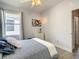 Bedroom with a full-size bed and window at 223 Knollwood Dr, Davenport, FL 33837