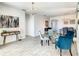 Open concept dining area with view of entryway at 223 Knollwood Dr, Davenport, FL 33837