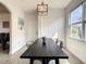 Bright dining area with farmhouse table and chairs at 223 Knollwood Dr, Davenport, FL 33837