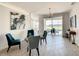 Bright dining area with view of pool and backyard at 223 Knollwood Dr, Davenport, FL 33837