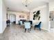 Open concept dining room, view of entry and kitchen at 223 Knollwood Dr, Davenport, FL 33837