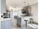 Modern kitchen with gray cabinets and island at 223 Knollwood Dr, Davenport, FL 33837