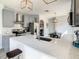 Modern kitchen with gray cabinets and white counters at 223 Knollwood Dr, Davenport, FL 33837