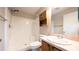 Bathroom with white shower and light-wood vanity at 3449 Roanoke St, The Villages, FL 32162