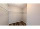 Walk-in closet featuring ample storage with shelves and rod at 3449 Roanoke St, The Villages, FL 32162