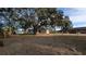 Large backyard with mature trees at 3639 Bream Cir, Fruitland Park, FL 34731