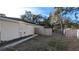 Large backyard with wooden fence and shed at 3639 Bream Cir, Fruitland Park, FL 34731