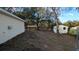 Backyard with shed and wooden fence at 3639 Bream Cir, Fruitland Park, FL 34731