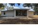 Screened patio with pavers and ceiling fan at 3639 Bream Cir, Fruitland Park, FL 34731