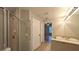 Bathroom with double vanity, shower, and tile flooring and light fixture at 3639 Bream Cir, Fruitland Park, FL 34731