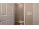 Small bathroom features a toilet, wood-look flooring, and neutral wall color at 3639 Bream Cir, Fruitland Park, FL 34731