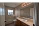 Bathroom featuring vanity, toilet, tub, and shower combo at 3639 Bream Cir, Fruitland Park, FL 34731