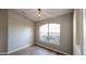 Charming dining area with large window and wood floors at 3639 Bream Cir, Fruitland Park, FL 34731