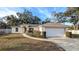 One-story house with attached garage and landscaped front yard at 3639 Bream Cir, Fruitland Park, FL 34731