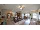Inviting living room showcasing wood floors, neutral paint, and a comfortable open layout at 3639 Bream Cir, Fruitland Park, FL 34731