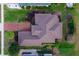 Bird's eye view of the home, showcasing its size and landscaping at 38626 Lakeview Walk, Lady Lake, FL 32159