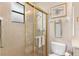 Bright bathroom with a shower and updated fixtures at 38626 Lakeview Walk, Lady Lake, FL 32159