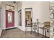 Inviting entryway with a small sitting area at 38626 Lakeview Walk, Lady Lake, FL 32159