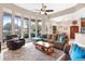 Spacious living room with ample natural light and comfortable seating at 38626 Lakeview Walk, Lady Lake, FL 32159