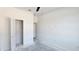 Bright bedroom with open closet and doorway, featuring a ceiling fan at 39817 Forest Dr, Eustis, FL 32736